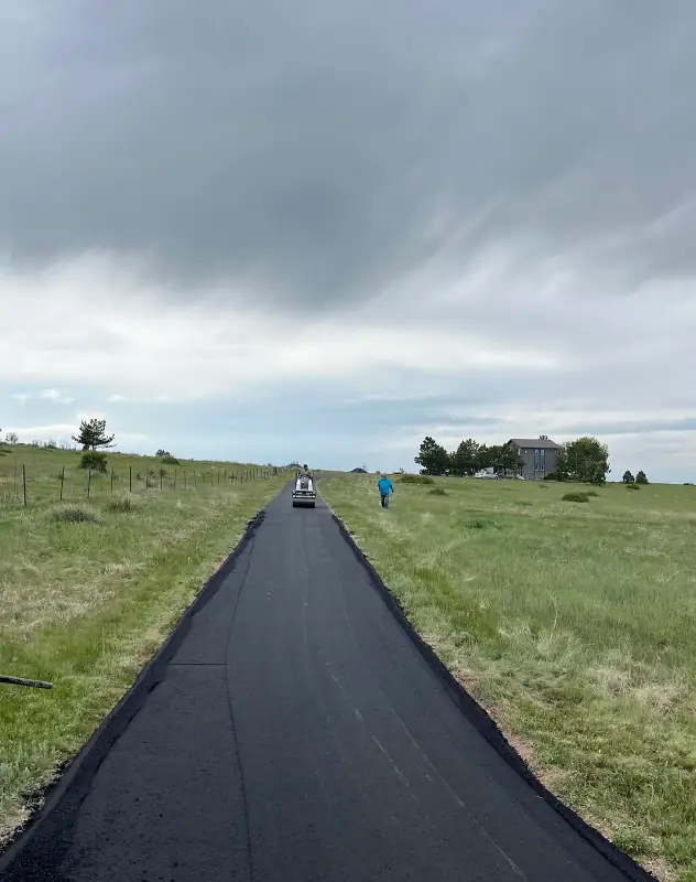 Long asphalt driveway in Larkspur being installed